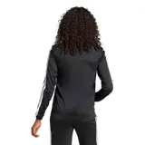 Campera deportiva Adidas de mujer, confeccionada en tejido tricot de poliéster. Presenta un diseño clásico en color negro con las icónicas tres tiras blancas en las mangas, cierre frontal completo, cuello alto y logo de la marca estampado en el pecho.
