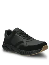 Championes urbanos de cuero negro con detalles en descarne, diseño con suela Spinal de alta amortiguación y base de goma para mayor tracción.