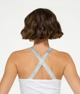 Musculosa blanca de algodón orgánico con tirantes finos cruzados de lurex plateado en la espalda.