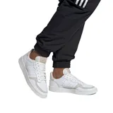 Zapatillas Adidas Supercourt blancas con detalles en gris claro.