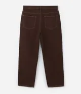 Pantalón baggy negro de sarga de algodón, con cintura fija con trabillas, botón contrastante y cierre por cremallera oculto, bolsillos laterales y traseros. Modelo holgado de corte recto y ancho.