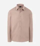 Camisa de manga larga confeccionada en tricolina de algodón, con cuello inglés, cierre frontal de botones y puños abotonados. Diseño liso y versátil.