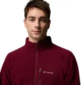 Buzo polar de hombre con cierre frontal parcial y cuello alto. Presenta un bolsillo vertical con cierre en el pecho y el logo de la marca bordado. Confeccionado en tejido polar suave, ideal para actividades al aire libre.