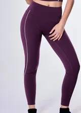 Calza larga deportiva color violeta con cintura alta y detalle de línea blanca en el lateral.