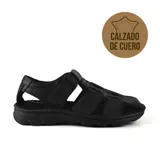 Sandalia casual de cuero negro, con múltiples tiras horizontales y ajuste con velcro.
