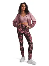 Calza deportiva de largo al tobillo con estampado abstracto en tonos bordó, negro y blanco. Presenta cintura alta y ancha con bolsillo lateral integrado.