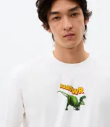 Remera blanca de algodón con cuello redondo y manga corta, con estampa localizada en la espalda del personaje Rex de Toy Story y la frase Were you scared? Tell me honestly.