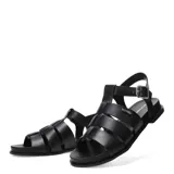 Sandalias tipo gladiadora marca Bottero, confeccionadas en cuero gamuzado color marrón. Presentan tiras anchas entrelazadas, suela plana de color negro y cierre lateral con hebilla metálica ajustable.