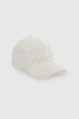 Gorra con visera curva de algodón, con estampado animal print en tonos beige y blanco, y monograma bordado en el frente.