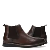 Botas tipo Chelsea de cuero color marrón, con paneles laterales elásticos y suela de goma con detalle de costura en el borde.