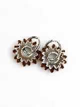 Dijes colgantes para aros de acrílico espejado en color marrón y transparente con diseño dentado en forma de sol.