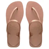 Sandalias tipo ojota Havaianas modelo Flash Urban, color negro, con diseño de tiras cruzadas que incluyen una correa trasera para mayor sujeción.