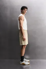 Musculosa de corte relajado confeccionada en tejido compacto de algodón, con cuello redondo y sisas con acabado irregular. Pertenece a la línea Zara Athleticz.
