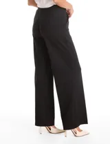 Pantalón wide leg de tiro alto con cintura ancha elástica y bolsillos laterales funcionales. Confeccionado en tejido elastizado de corte recto y pierna ancha.
