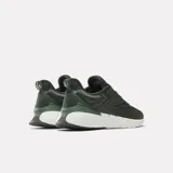 Championes de entrenamiento Reebok Nano Gym, color verde militar con suela blanca y detalles en negro.