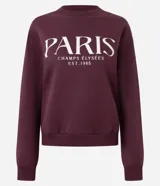 Saco de algodón color bordó con cuello redondo y mangas largas. Tiene ribete en cuello, puños y bajo. Estampado frontal con la leyenda "Paris - Champs Élysées - Est. 1965".