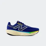 Championes de running New Balance Fresh Foam X 1080, color azul con detalles en amarillo, blanco y verde/naranja en la suela. Presentan una parte superior de malla jacquard y una entresuela gruesa de espuma Fresh Foam X.