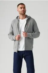Buzo hoodie Levi's Core NG Zip Up gris con cierre frontal, capucha con cordón ajustable, mangas largas y logo bordado en el pecho.