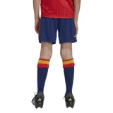 Short de fútbol Adidas de la selección española, modelo primera equipación 2026. Diseño azul con detalles en rojo y amarillo.