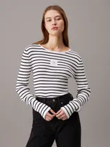 Sweater ajustado de lyocell a rayas horizontales blancas y negras, con cuello redondo y logo de Calvin Klein en el pecho.