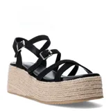 Sandalias de plataforma Miss Carol Corena color negro, con múltiples tiras finas, hebillas metálicas regulables y suela revestida en yute tipo espadrille.