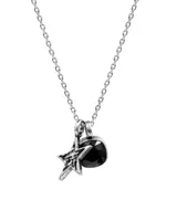 Collar con cadena de plata de ley 925 y dos colgantes hechos a mano: una estrella con textura y una piedra negra facetada de ónix.