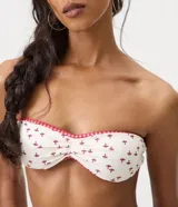 Top de bikini bandeau de microfibra, con diseño de estampa de hongos y detalles de ribete con estampado a cuadros en los bordes.