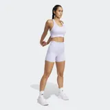 Calzas cortas de running ajustadas, color lila claro, con tiro alto, cintura elástica con cordón ajustable y bolsillos laterales.