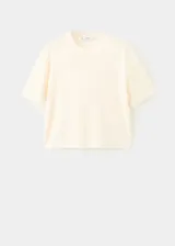 Camiseta de punto fino oversize color beige, con cuello redondo y manga corta.