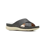 Sandalias casuales Korium Confort Ioanna con tiras cruzadas texturizadas en color negro, plataforma baja y costuras pespunteadas en contraste.