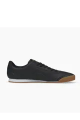 Championes deportivos Puma Turino FSL, color blanco con la característica franja lateral de Puma en negro, suela de goma estriada y puntera reforzada.