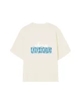 Remera color crema de corte holgado con estampado en la espalda de la frase 'Ibiza Ittai' con letras formadas por cubos de hielo.