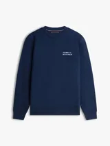 Buzo de cuello redondo color azul marino, de mangas largas con puños y cintura elásticos. Presenta el logo bordado de Tommy Hilfiger en el pecho.
