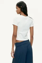 Pantalón globo negro de punto de viscosa, con cintura elástica ancha fruncida y piernas anchas con elástico revestido en los tobillos.