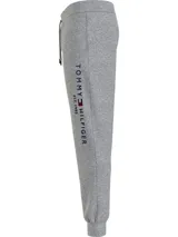 Pantalón de jogging gris melange de Tommy Hilfiger, con cintura elástica ajustable con cordón, bolsillos laterales y logo de la marca bordado en la pierna.