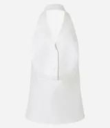 Chaleco blanco de tweed texturizado con espalda abierta, botones delanteros y solapas.