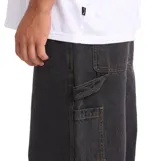 Pantalón de jean Billabong modelo Bad Dog, color negro, de corte holgado y estilo carpintero.
