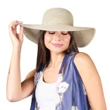 Sombrero de paja color beige con ala ancha y copa redonda.