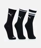 Kit de tres pares de medias deportivas Puma de caña larga, color blanco con detalles en negro. Incluye logo de la marca y diseño con rayas en la parte superior.