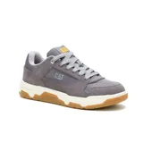 Championes Caterpillar modelo Theorem, color gris con detalles en amarillo. Presentan una combinación de gamuza y material sintético, con suela de goma en tono caramelo y entresuela blanca.