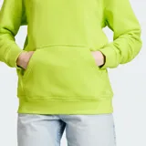 Hoodie Adidas Adicolor Essentials Regular color verde lima, con capucha ajustable con cordón, bolsillo tipo canguro y el logo del trifolio bordado en el pecho.