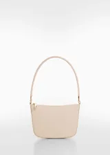 Bolso mini color beige con efecto piel, asa de hombro y cierre de cremallera.