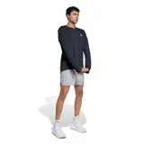 Remera deportiva de manga larga Adidas modelo Running Essentials, de color negro con el logo de la marca estampado en blanco en el pecho.