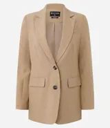 Blazer color camel de poliéster y viscosa, corte sastre comfort, con solapa en el cuello, abotonado delantero, solapas delanteras que simulan bolsillos y puntadas de costuras discretas coloridas.