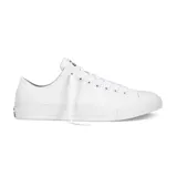 Championes Converse modelo Chuck Taylor All Star en versión monocromática blanca. Diseño clásico de caña baja con capellada de lona, puntera de goma y suela vulcanizada.