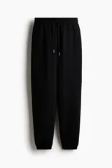 Pantalón de jogging negro de tiro alto en felpa de mezcla de algodón, con cordón ajustable en la cintura y elástico en cintura y bajos.