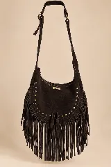 Cartera bandolera Valdez de cuero marrón oscuro, con flecos largos, detalles de tachas doradas y borlas colgantes. Cuenta con correa regulable y cierre superior.