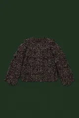 Saco tejido de algodón en color marrón oscuro, con diseño de volados superpuestos en capas y cierre frontal con botones.