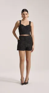 Top corto de tweed color cereza con escote cuadrado y tirantes anchos.