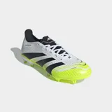 Championes de fútbol Adidas Predator League FG, color blanco con tres franjas negras y detalles en amarillo neón. El exterior presenta un patrón texturizado tipo piel de serpiente en blanco y negro, con la puntera en amarillo neón.